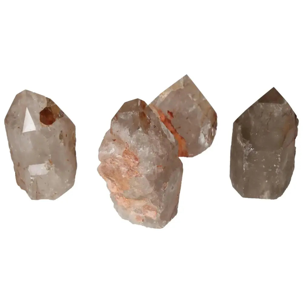 Polished Point Quartz with Hematite, premium crystal by Sylvia Crystals, offering elegance and spiritual benefits, four pieces displayed.
