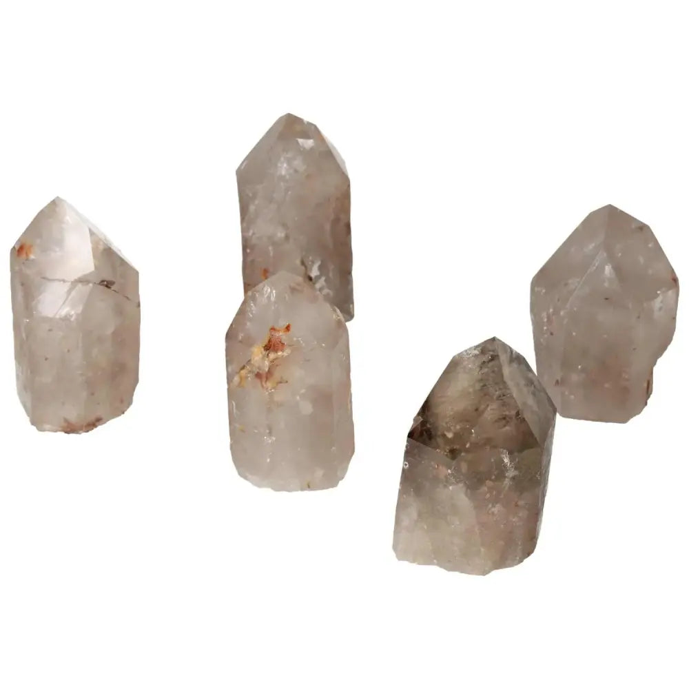 Polished Point Quartz with Hematite crystals enhancing energy and elegance, a premium Sylvia Crystals product for collectors and growth.