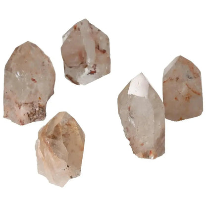 Polished Point Quartz with Hematite by Sylvia Crystals showcasing raw elegance and metaphysical power, perfect for home and personal strength.