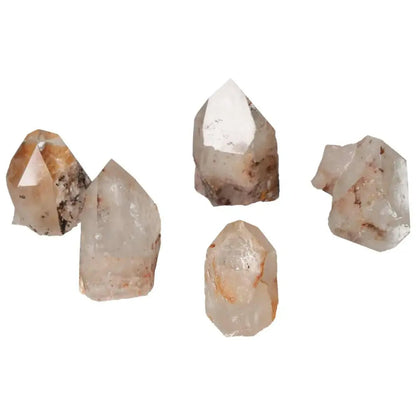 Polished Point Quartz with Hematite S from Sylvia Crystals displayed elegantly, showcasing its natural beauty and metaphysical properties.