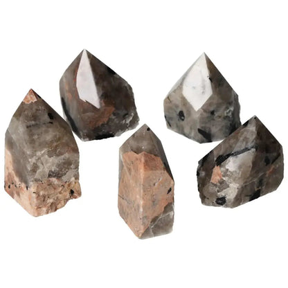 Polished Point Quartz with Tourmaline inclusions, premium crystal from Sylvia Crystals, showcasing unique patterns and striking elegance.