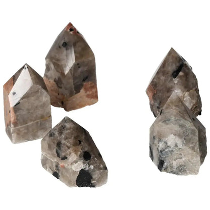 Polished Point Quartz with Tourmaline: Unique clear quartz crystal with black tourmaline inclusions by Sylvia Crystals.