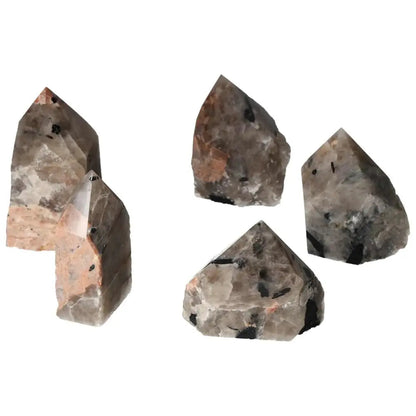 Polished Point Quartz with Tourmaline L gemstones showcasing unique black inclusions; ideal for crystal collections.