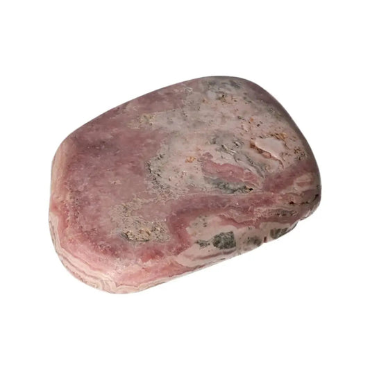 Polished Rhodochrosite from Sylvia Crystals showcasing pink hues and unique banding, known as a Stone of Love and Compassion.