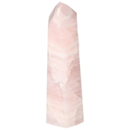 Polished Rose Quartz Obelisk displaying elegant and spiritual beauty, handpicked by Sylvia Crystals for luxury and harmonious energy.