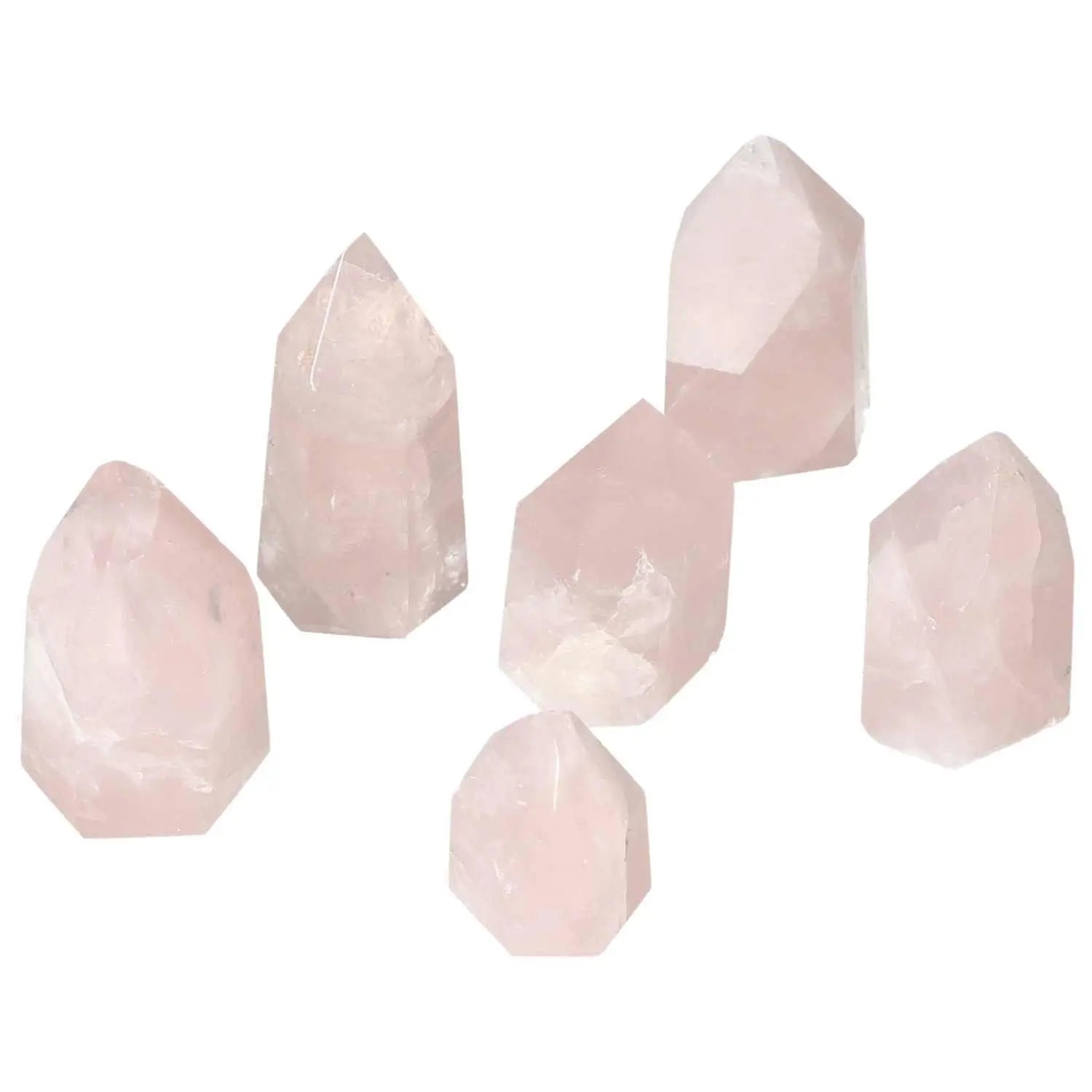 Collection of polished rose quartz obelisks, showcasing natural pink hues, ideal for enhancing space aesthetics and energy flow.