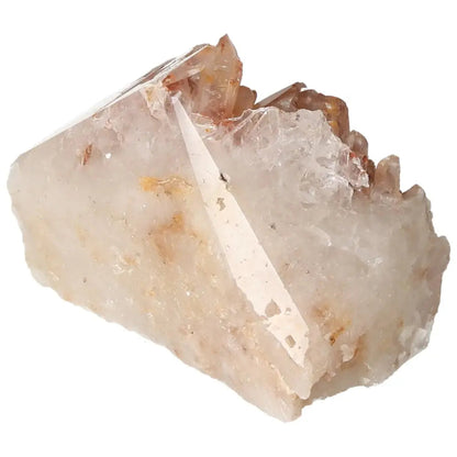 White quartz crystal with jagged edges and a polished surface