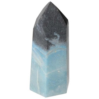 Polished Trolleite Obelisk with blue hues by Sylvia Crystals, symbolizing intuition and spiritual enlightenment.