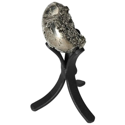 Polished pyrite heart on display stand, showcasing its golden luster and grounding energy ideal for home decor and spiritual spaces.