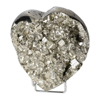 Polished pyrite heart shape with golden luster, showcasing the stone's radiant energy and grounding power, on a white background.