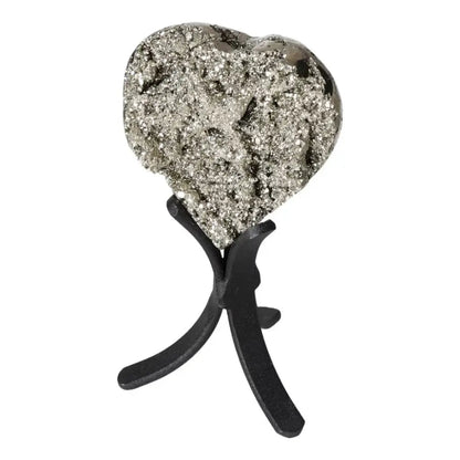 Polished pyrite heart on display stand showcasing radiant golden luster and grounding energy for home decor.