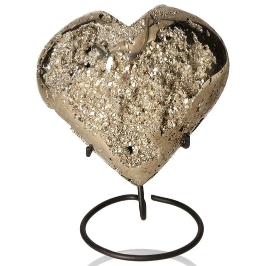 Heart-shaped pyrite mineral on a stand, showcasing its golden hue and metallic luster, symbolizing abundance and prosperity.