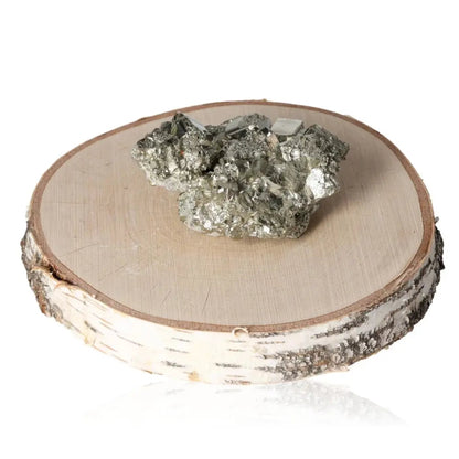 Pyrite druze on wooden slab showcasing golden hue and metallic luster, known for its abundance and prosperity symbolism.