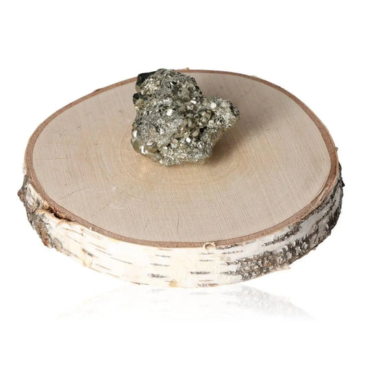 Pyrite druzy on rustic wooden display, showcasing its golden hue and metallic luster, symbolizing abundance and prosperity.