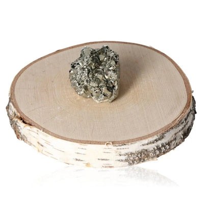 Pyrite druzy crystal on a wooden display slice, showcasing its golden hue and metallic luster. Perfect for attracting wealth and prosperity.