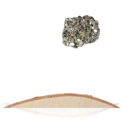 Floating pyrite druzy crystal with sparkling metallic luster, showcasing its golden hue, symbolizing abundance and prosperity.