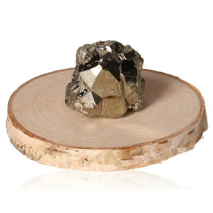 Pyrite druze on wooden slice, showcasing gold-like metallic luster, symbolizing abundance and prosperity.