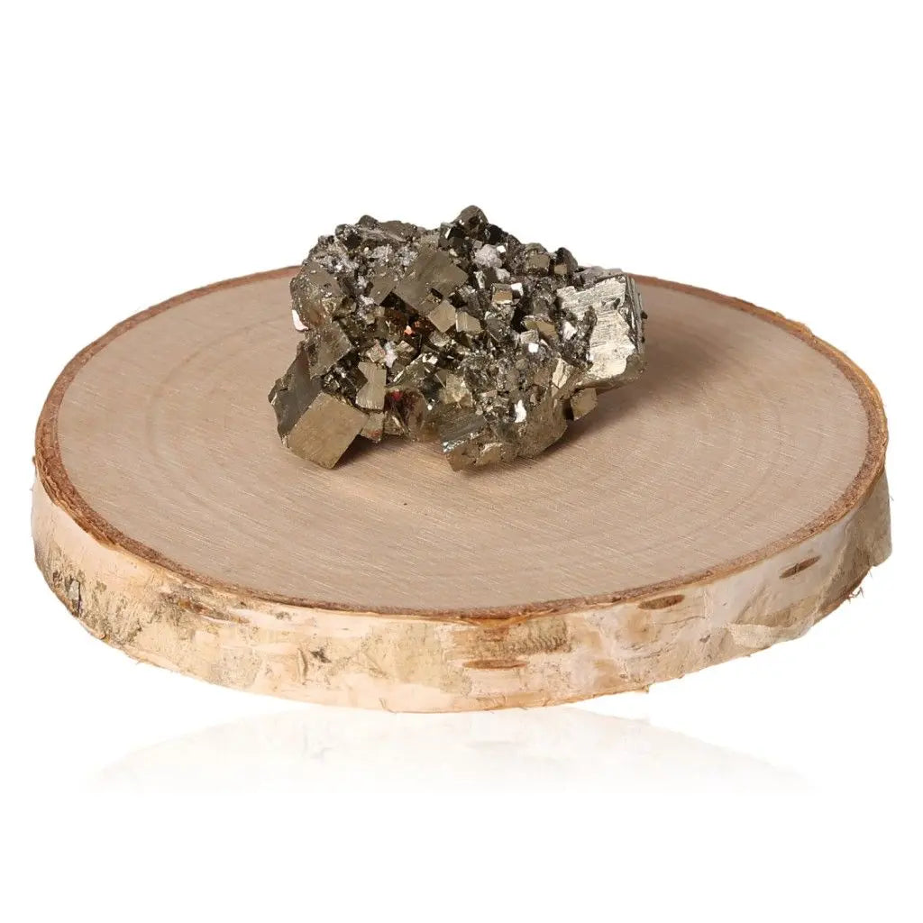 Shimmering pyrite druze crystal on a wooden display, showcasing its golden metallic luster, ideal for attracting abundance and prosperity.