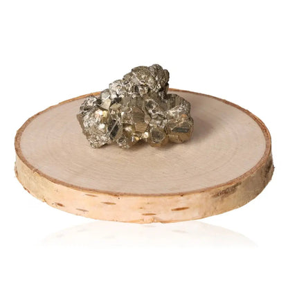 Pyrite druze on wooden display, showcasing its shimmering golden hue and metallic luster, symbolizing abundance and prosperity.