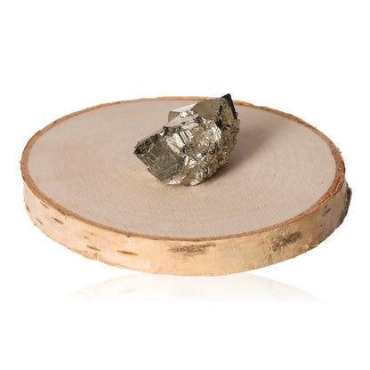 Pyrite druze crystal with golden hue and metallic luster displayed on a round wooden base, symbolizing wealth and prosperity.
