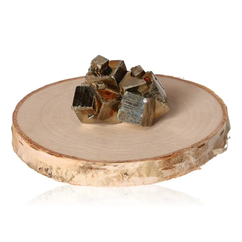 Pyrite druze cluster on wooden base, showcasing golden metallic luster, symbolizing abundance and prosperity.
