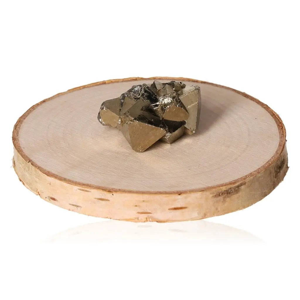 Golden pyrite druze displayed on a wooden stand, showcasing its radiant metallic luster and natural allure.