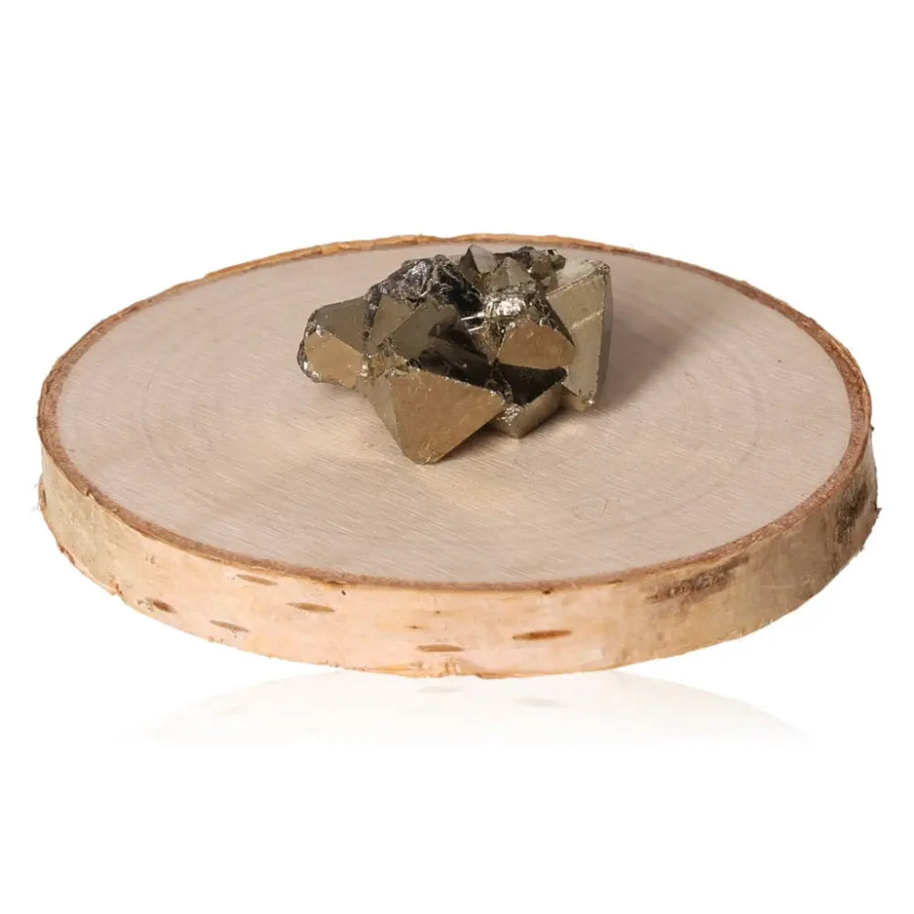 Pyrite druze on wooden stand showcasing metallic luster and golden hue, known as "Fool's Gold," symbolizing wealth and prosperity.