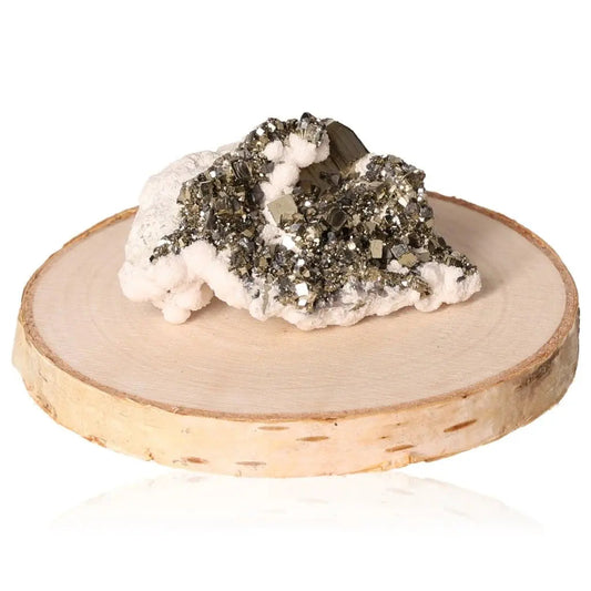 Close-up of shining pyrite druzy crystal resembling "Fool's Gold," showcasing its golden hue and metallic luster on a wooden base.
