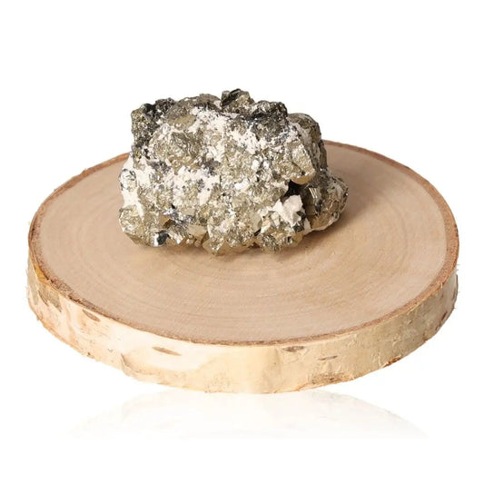 Pyrite druzy stone on a wooden base showcasing its golden metallic luster, symbolizing abundance and prosperity.