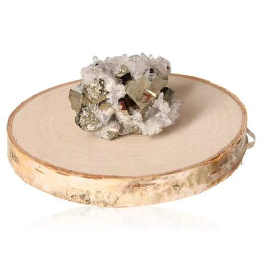 Pyrite druzy crystal with metallic luster on wooden base, symbolizing abundance and prosperity.