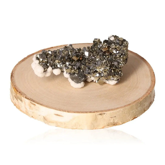Pyrite druze crystal displaying metallic luster on wooden base, known as Fool’s Gold for its golden hue and symbolic prosperity.