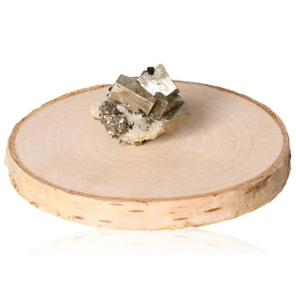 Pyrite druze crystal on wooden slab, known for its golden hue and metallic luster, symbolizing abundance and prosperity.