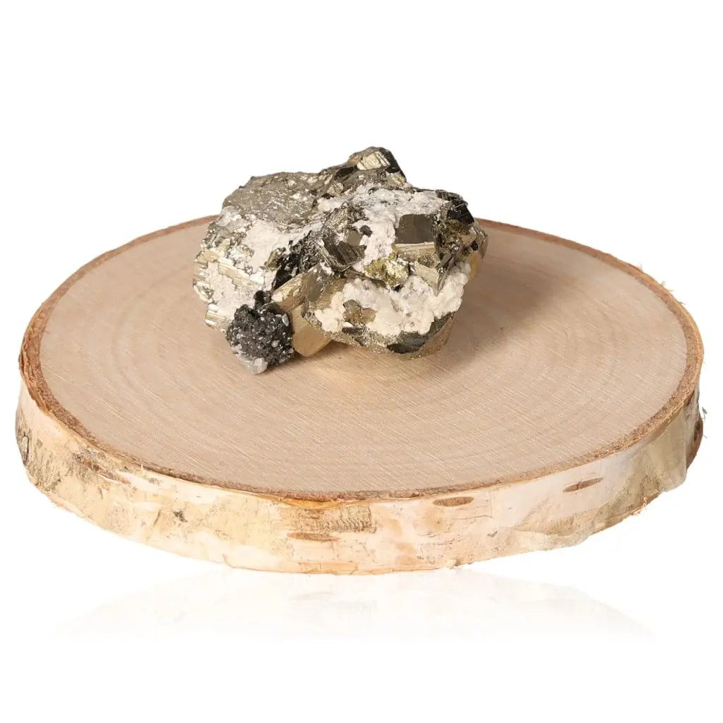 Pyrite Druze on a wooden base, showcasing its golden hue and metallic luster, known for attracting abundance and success.