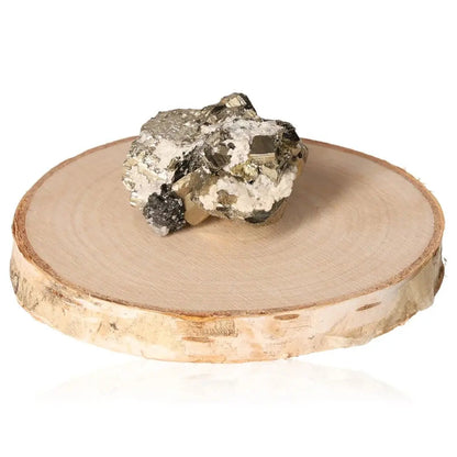 Pyrite Druze on a wooden base, showcasing its golden hue and metallic luster, known for attracting abundance and success.
