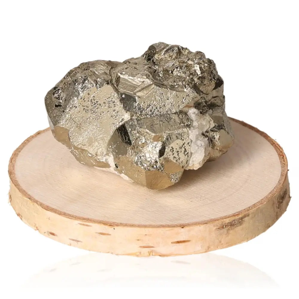 Pyrite druzy stone with golden metallic shine on wooden stand, symbolizing abundance and prosperity.