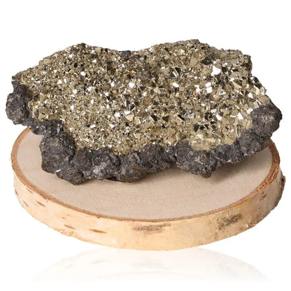 Pyrite druze mineral with brilliant golden hue and metallic luster on wooden base, known for wealth and prosperity symbolism.