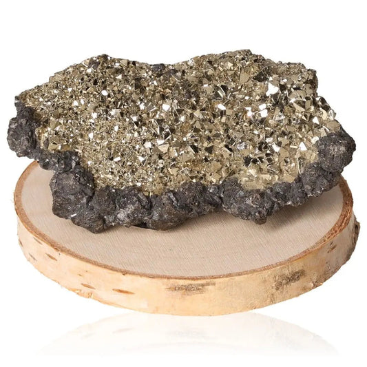 Pyrite druze mineral with brilliant golden hue and metallic luster on wooden base, known for wealth and prosperity symbolism.