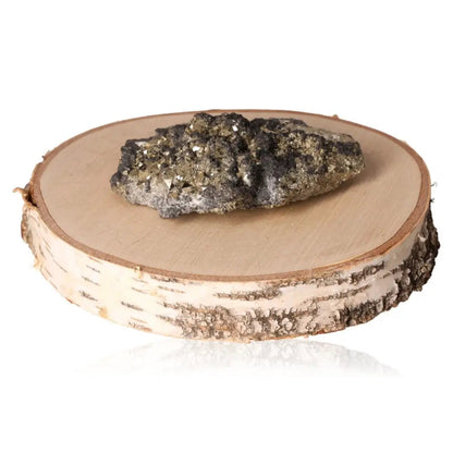 Pyrite druze on wooden slab showcasing its metallic luster and golden hue, known for attracting wealth and prosperity.