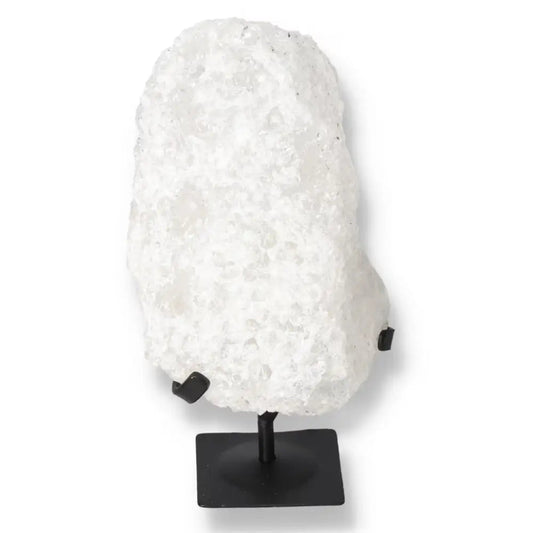 Quartz Crystal Bubble on display stand, featuring natural inclusions and unique colors for metaphysical growth.
