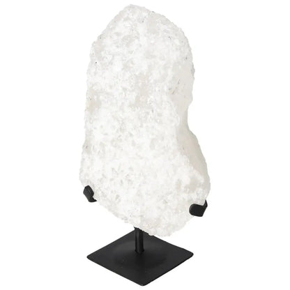 Quartz Crystal Bubble from Sylvia Crystals on stand, showcasing natural inclusions and unique colors for spiritual and personal growth.