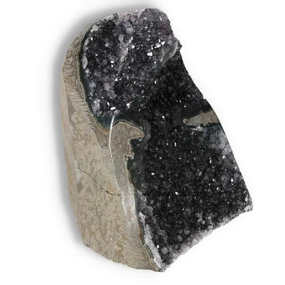 Quartz Cut Base Geode with sparkling crystals from Sylvia Crystals, showcasing captivating patterns and rich hues for tranquility.
