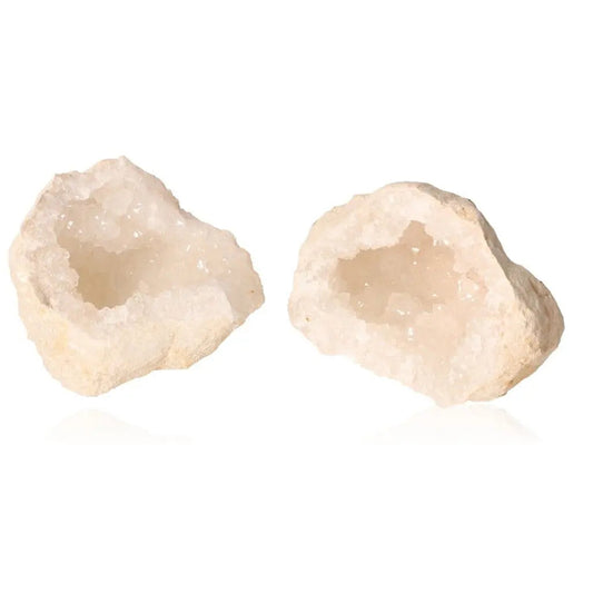 Quartz geode split open to reveal shimmering milky crystals, showcasing nature's artistry and captivating beauty.