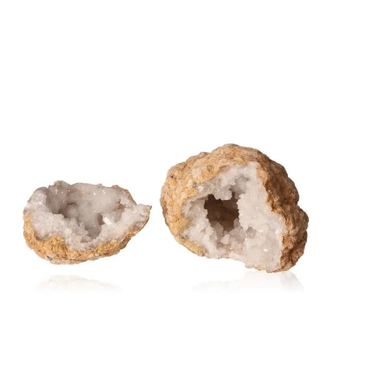 Quartz geode split open, revealing sparkling cloudy white crystals within rugged earthy shell, weighing between 700-900g.