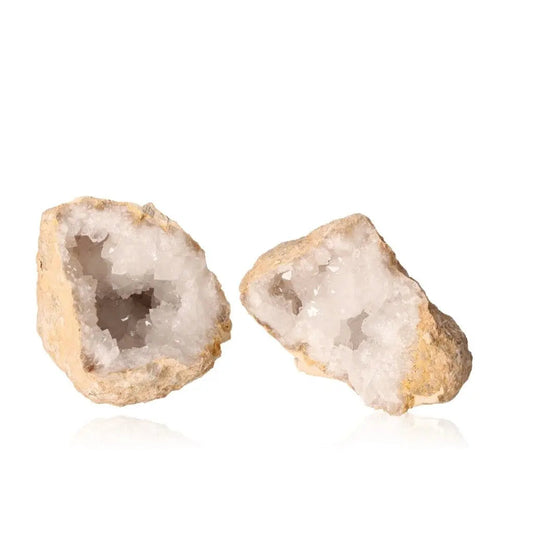 Quartz Geode 700-900g showcasing open halves with sparkling white crystals for transformative and purifying energy.