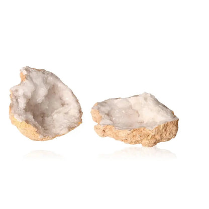 Quartz Geode split open, showcasing sparkling white crystals and natural earthy exterior, weighing 700-900g for home decor and tranquility.