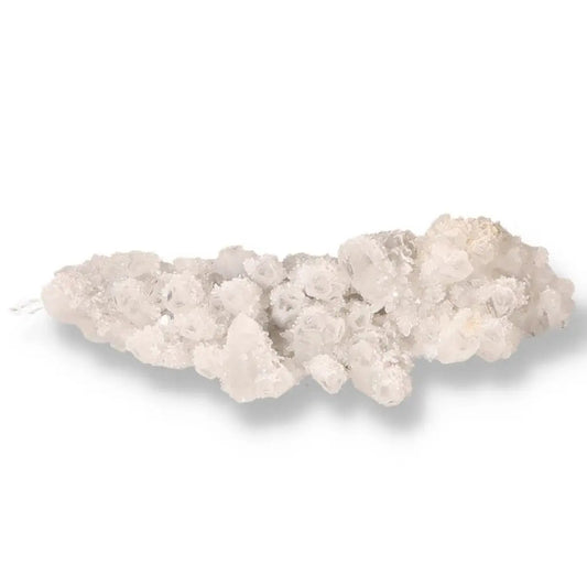 White quartz crystal cluster showcasing natural formations, ideal for energy healing and spiritual enhancement.