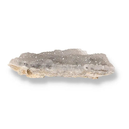 Translucent quartz gemstone showcasing natural crystal formations and sparkling clarity against a white background
