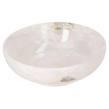 Elegant rose onyx bowl with smooth polished surface and unique natural veining, adding a sophisticated touch to any decor.