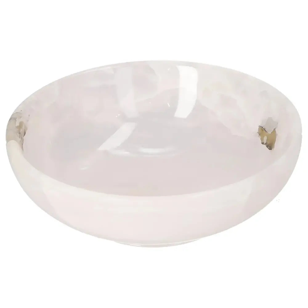 Rose Onyx Bowl with delicate veining and organic color, showcasing a polished surface that reflects light for a sophisticated décor accent.