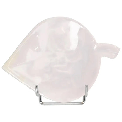 Rose onyx small platter with unique color variations, showcasing a smooth, polished surface on a metal stand.